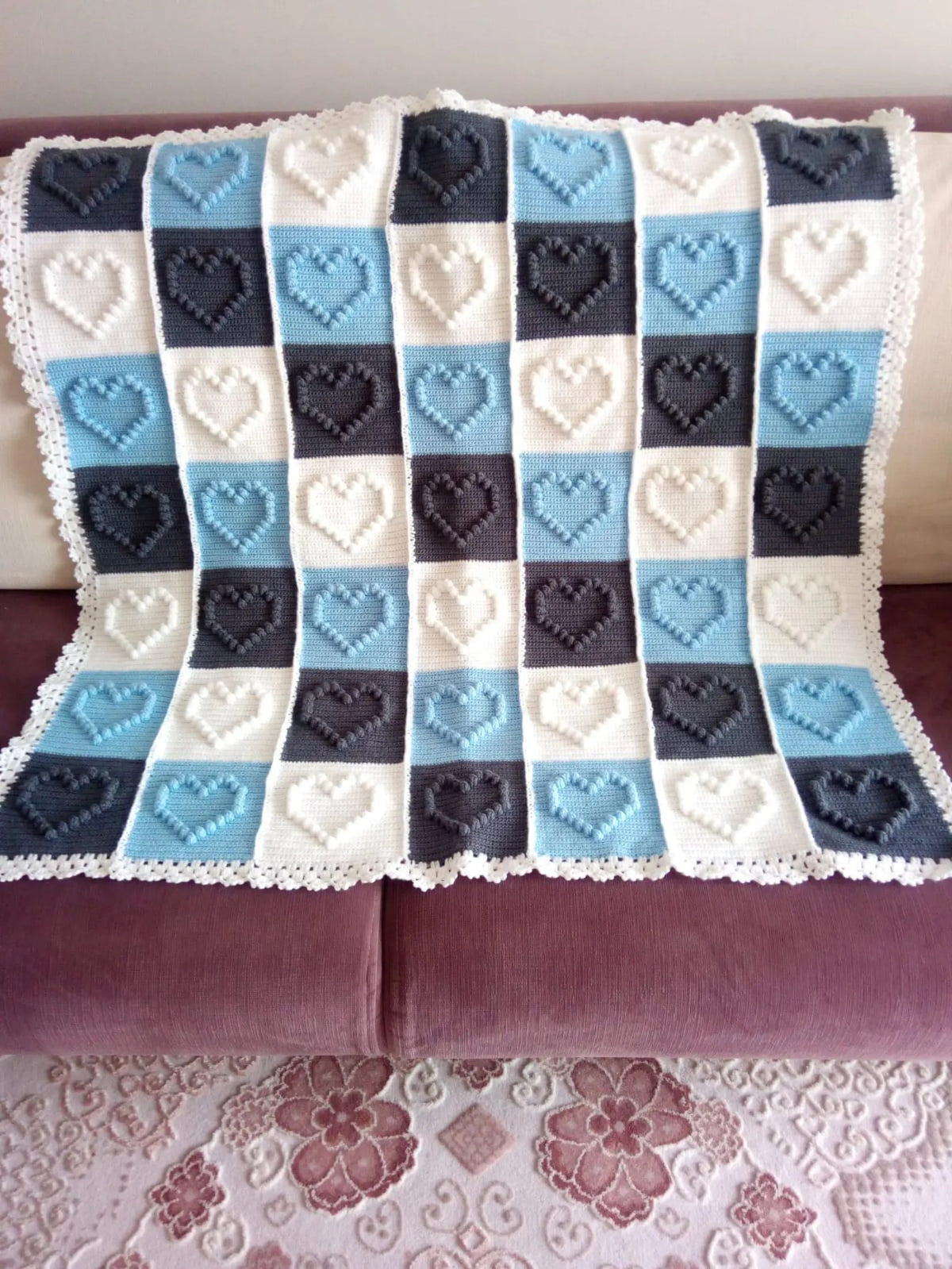 Cozy handmade baby blanket with heart motifs – crochet project